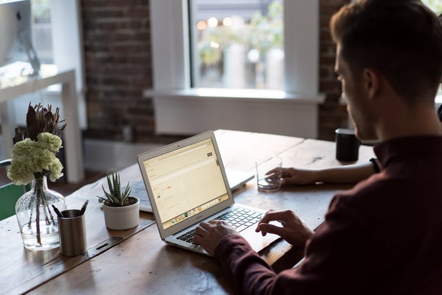 man working on computer